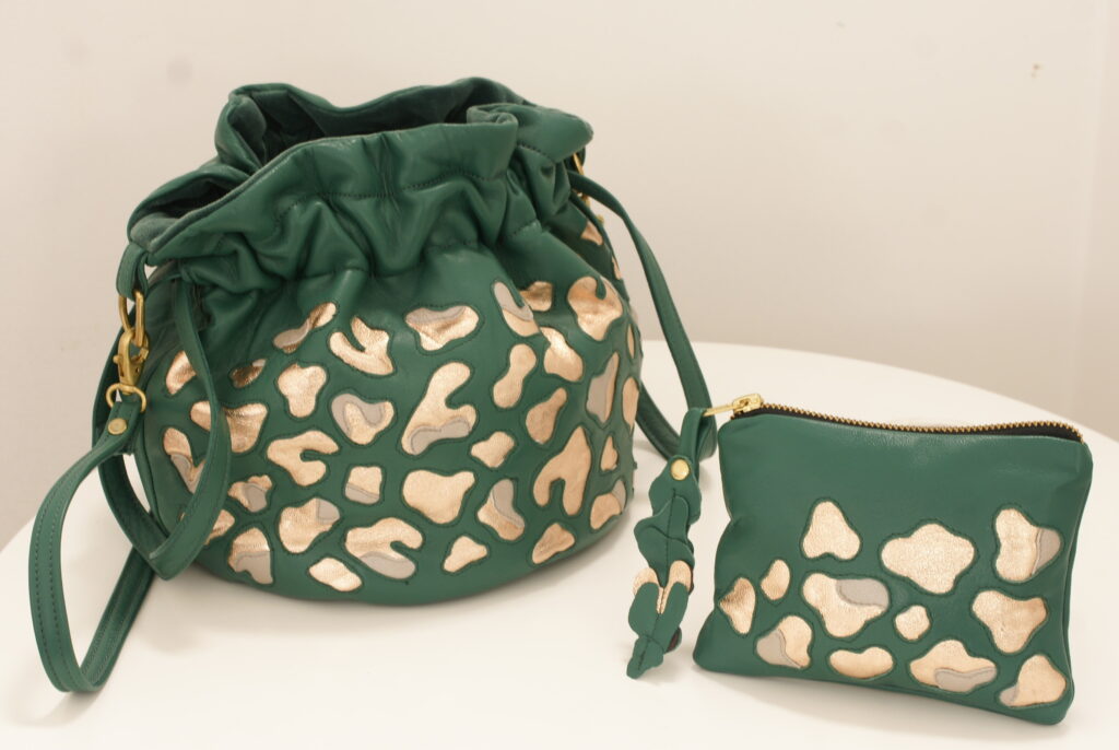 Libertas leather bags in green by Amma Gyan at Amanartis