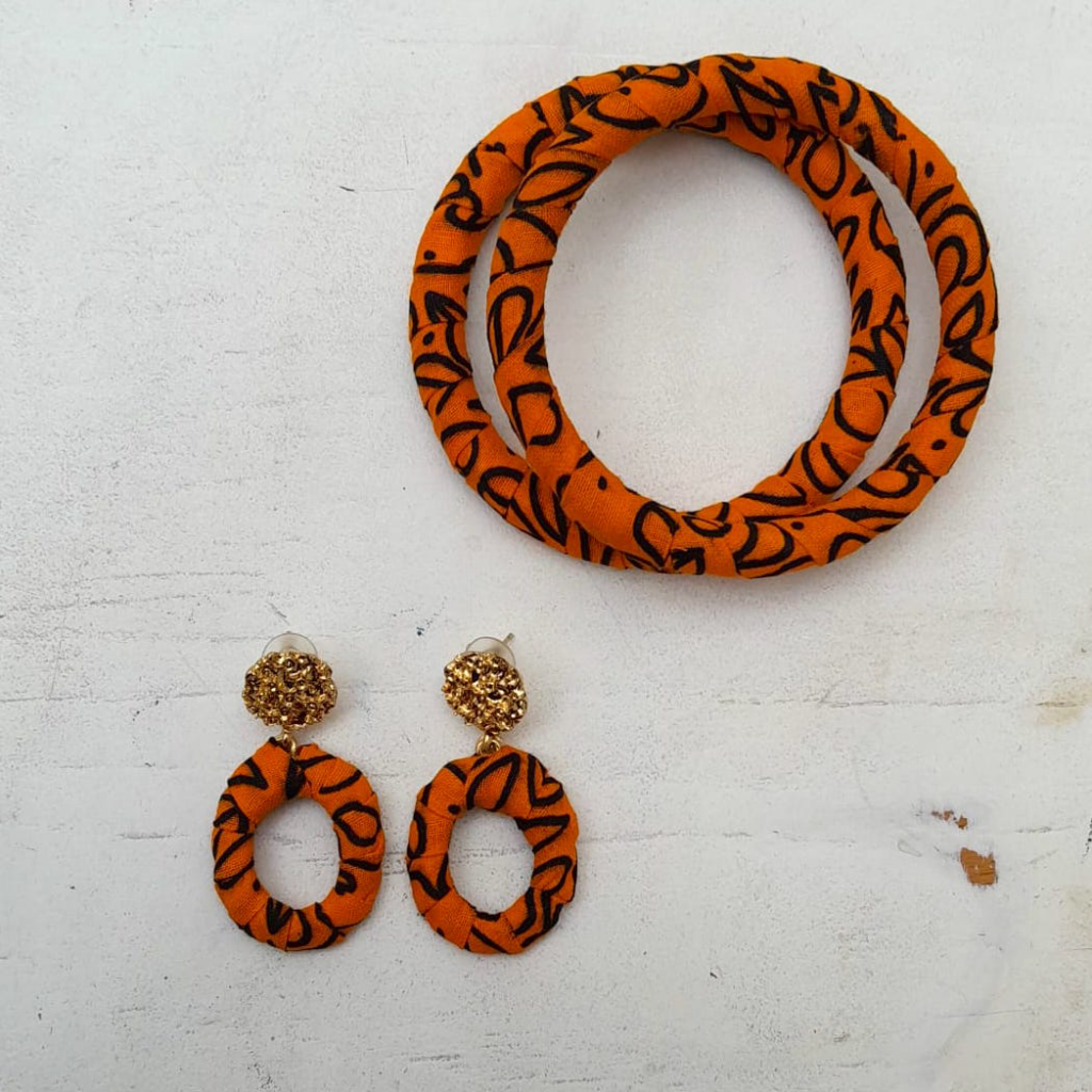 Orange and Black African fabric and brass earrings by Jumandy Fabrics at Amanartis at the Atria by Amma Gyan 4