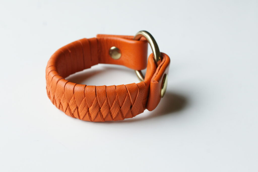 Reign designer handmade leather bracelet by Amma Gyan of House of Amma, Amanartis and Amma Gyan Art