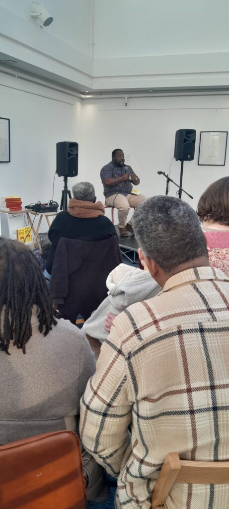 Poetry reading image at Amanartis Gallery at the House of Amma - The Art of Living 1