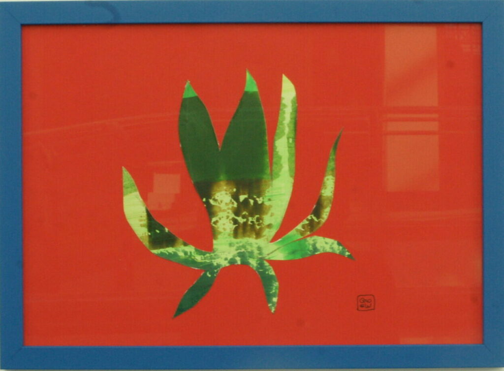 Cacti by Glenda Wood inspired by the Jardin Majorelle Marrakesh Morroco. Acrylic painted cacti cut out in green and yellow on solid red background with a blue frame